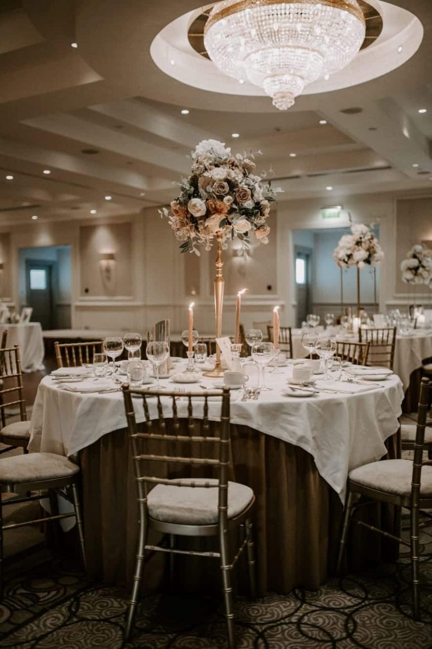 Wedding table with Floral arrangement and candles